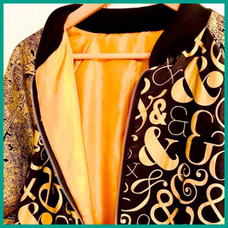 A picture of something you can make at Sarah Marie’s Sewing School - a bomber jacket made by a student with bold metallic fabrics.